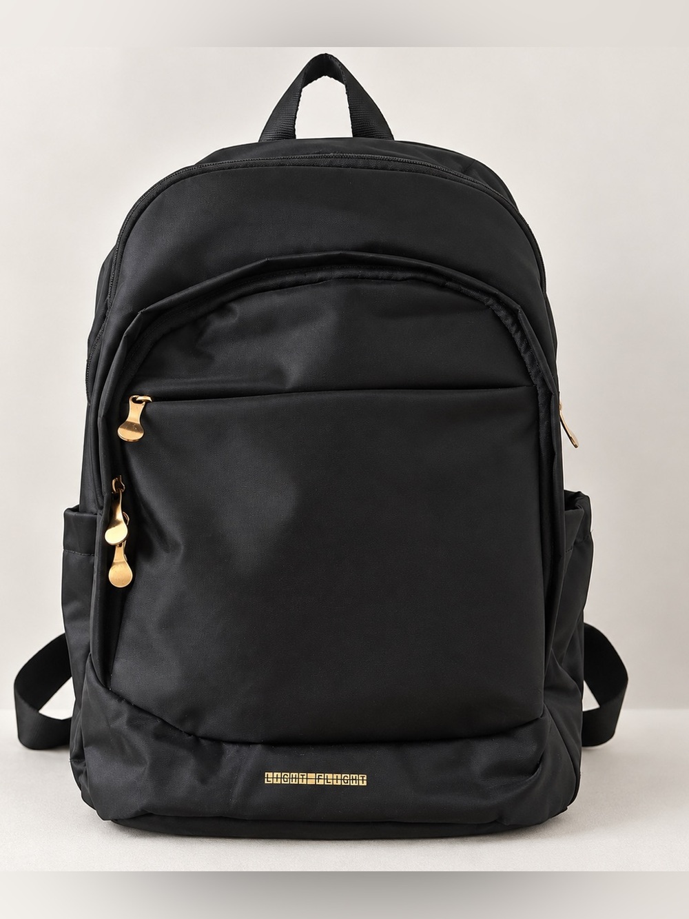 LIGHT FLIGHT Black Laptop Travel Backpack Gold Hardware Work Bag